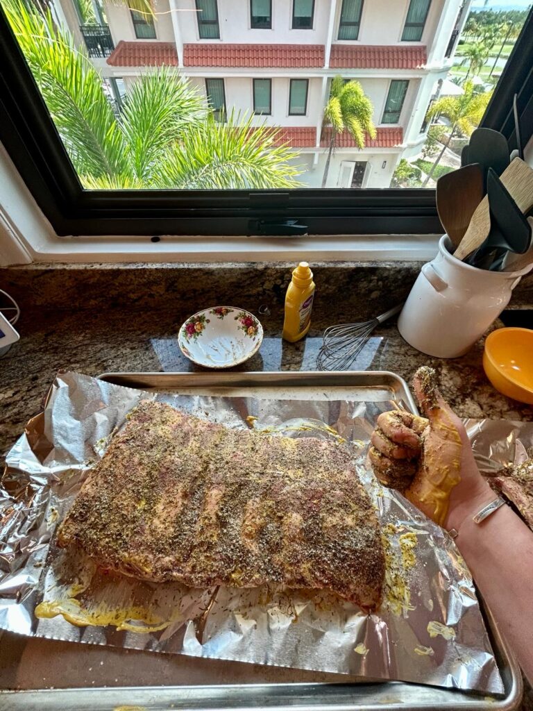 This image feature beef ribs that are being prepared following Cow and Girl's oven baked ribs recipe.