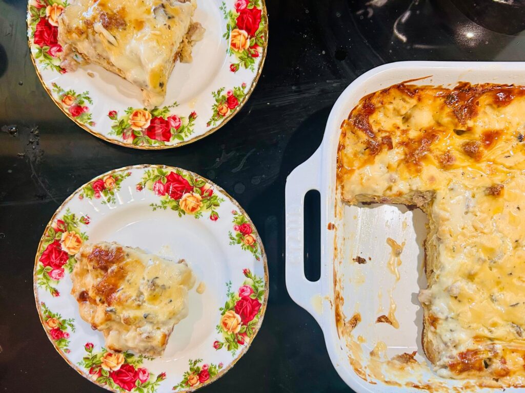 This image features two serving of egg bake casserole and a casserole dish full of cow and girl's egg bake casserole. Birds recipe